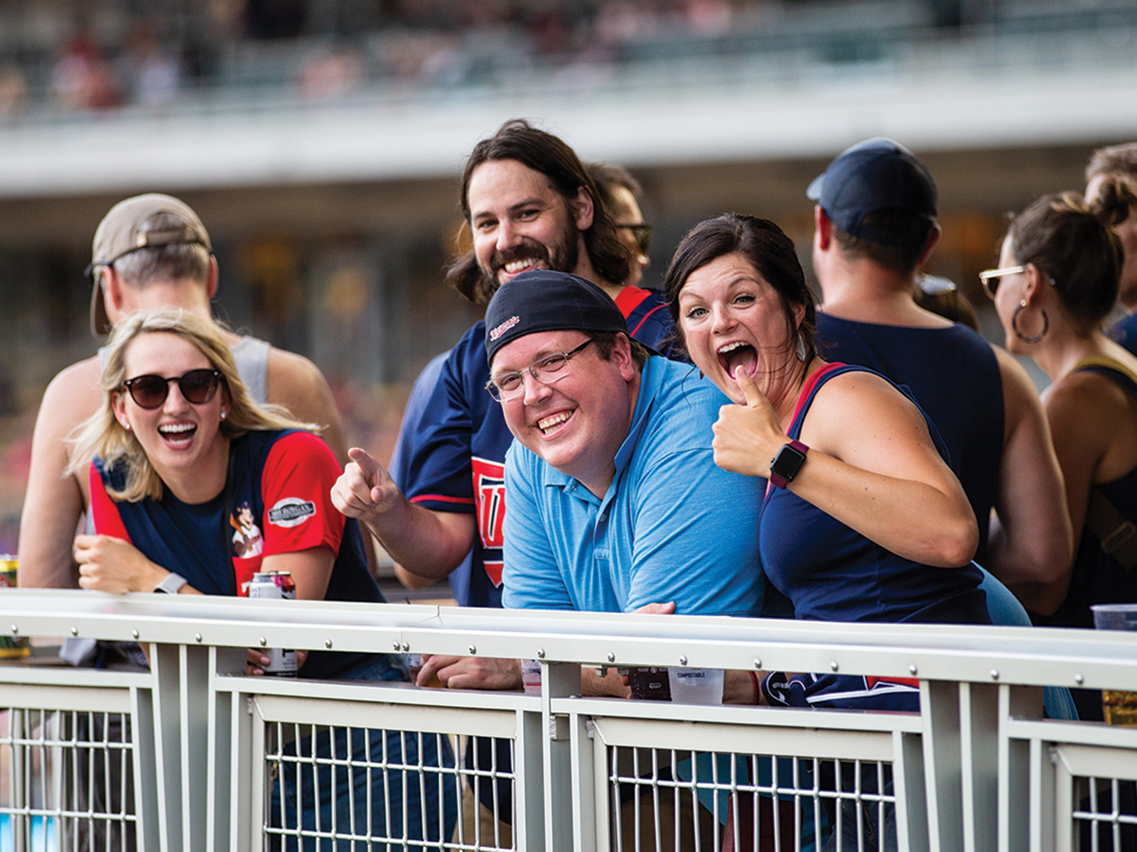Fans at a Twins game enjoying themselves