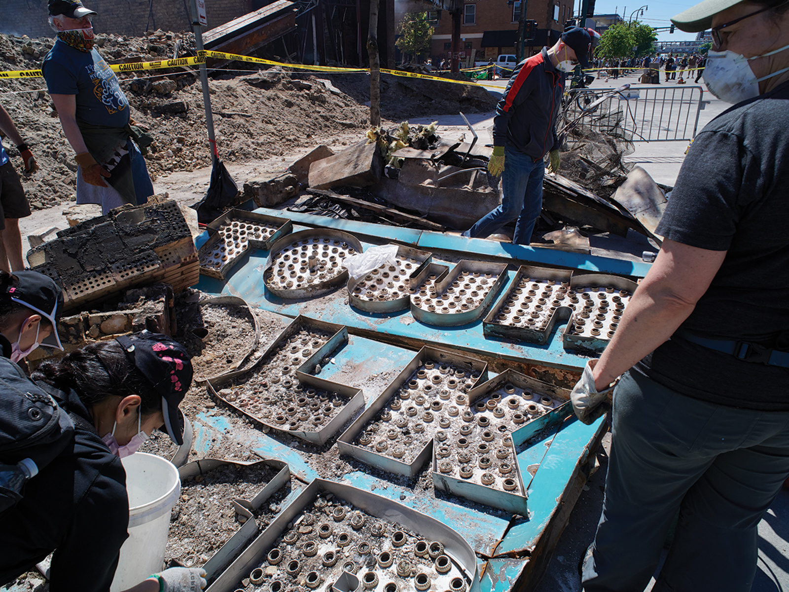 town talk diner's store front sign in a pile of rubble