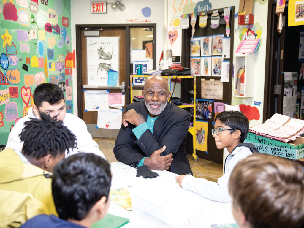 Alan Page talking to school kids