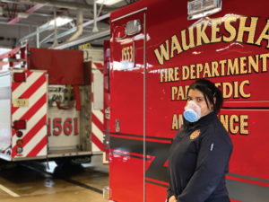 First responder with mask on