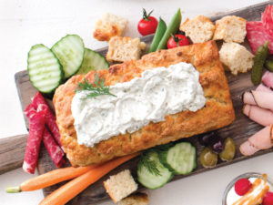 bread bowl with dip and vegetables
