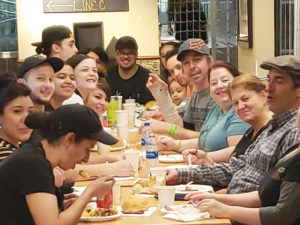 Allie's Deli team enjoying a Thanksgiving meal