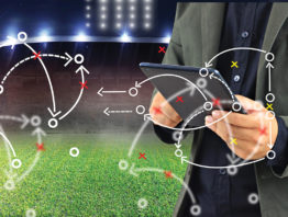 football field and playbook photo illustration