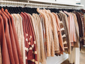 rack of sweaters