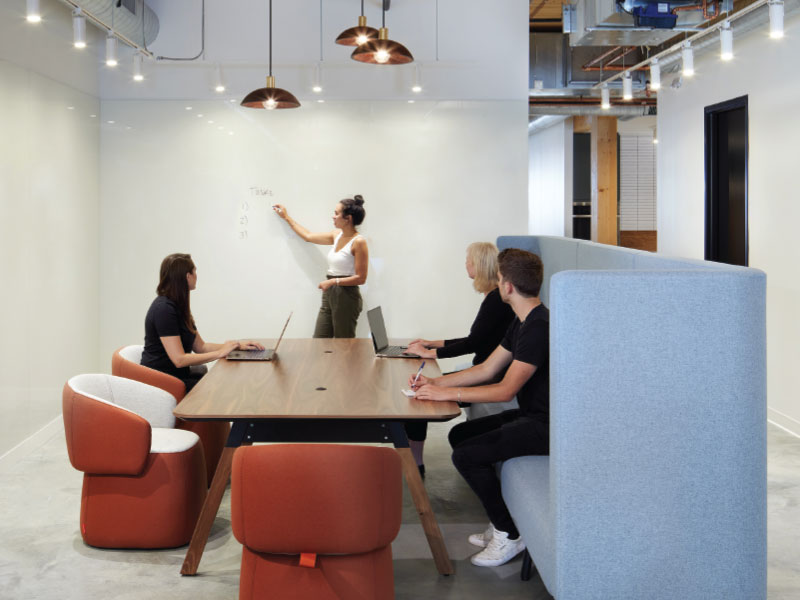 Meeting room with a whiteboard wall