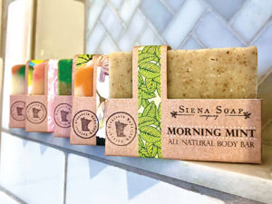 Several soap products on a shelf