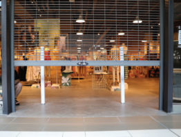 Store gate half closed