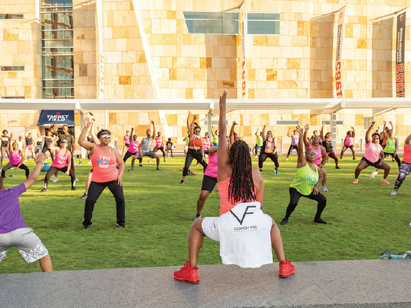 Valerie Fleurantin leading a VF Health Fitness Solutions class at Target Field in Minneapolis