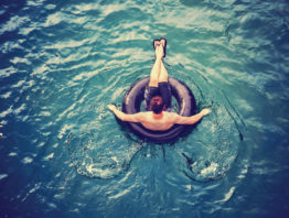 person in inner tube in the water