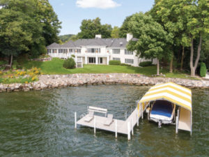 big white house on lake