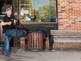 delivery driver walking out of Pizza Luce front door in Minneapolis