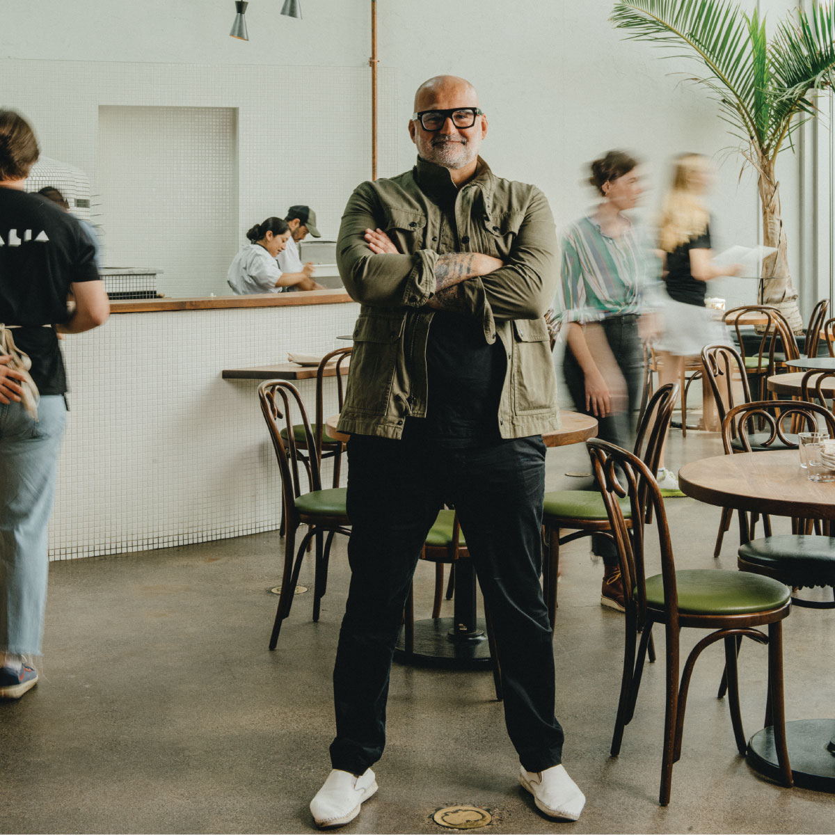 Daniel Del Prado standing in his restaurant