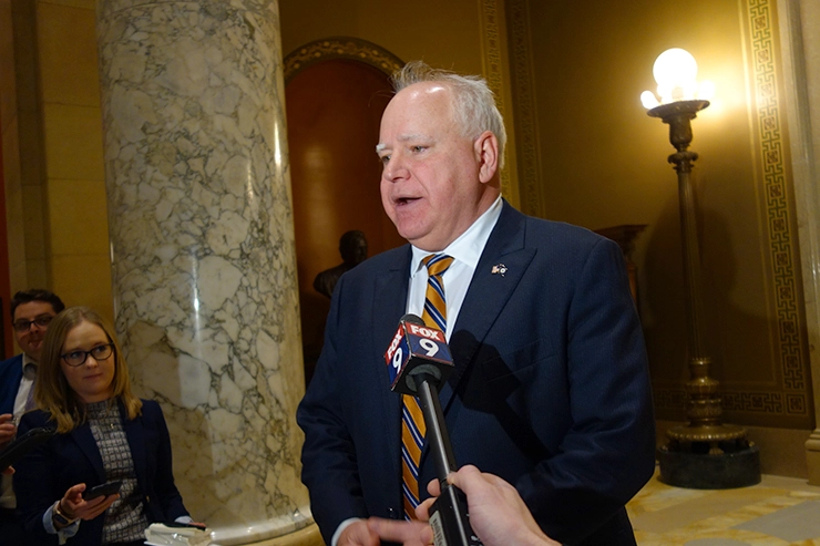 Gov. Tim Walz speaking to members of the press on Tuesday.