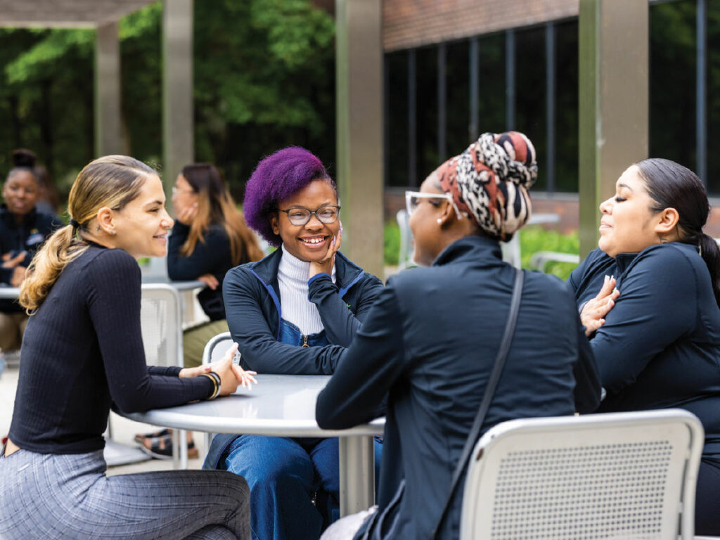group gathering at outdoor table