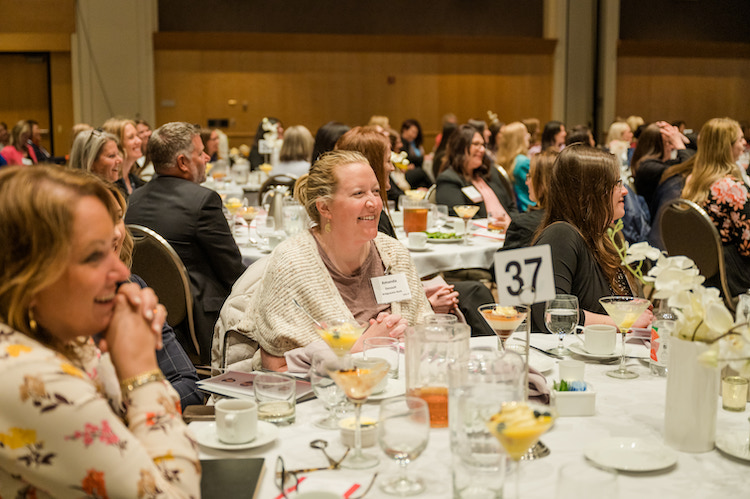 scenes from TCB's 2023 Women in Leadership event at the Saint Paul RiverCentre