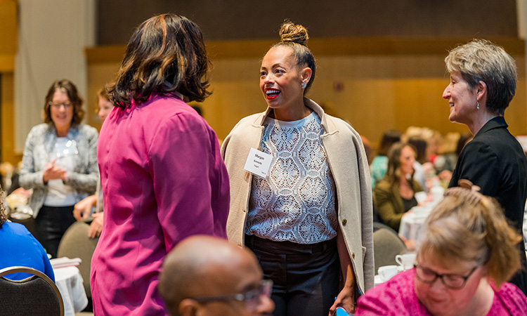 scenes from TCB's 2023 Women in Leadership event at the Saint Paul RiverCentre