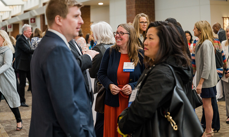 scenes from TCB's 2023 Women in Leadership event at the Saint Paul RiverCentre