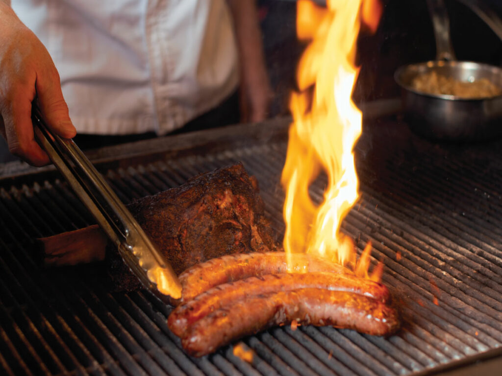 They have the meats: sausages and long rib on the grill at The Butcher’s Tale