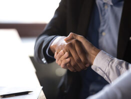 Closeup shot of two businesspeople shaking hands
