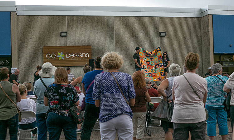 Erla at a quilting event at her Chaska warehouse.