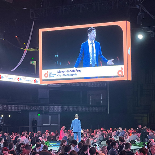 Minneapolis Mayor Jacob Frey speaking on stage at The Armory at the Minneapolis Downtown Council's 2024 annual meeting.