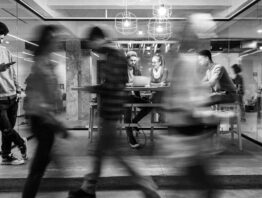 Blurred conceptual image of workers in an office