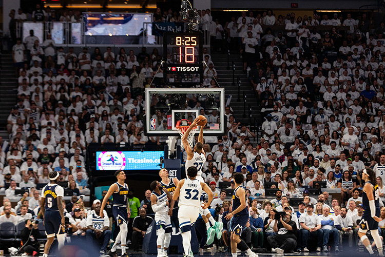 Timberwolves player scoring a shot