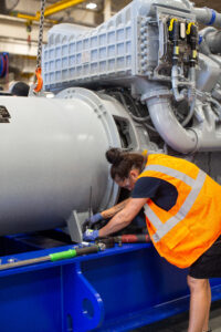 Rolls-Royce technician working on a company power generation set.